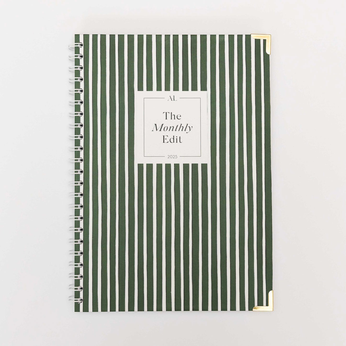 Alexa Lily The Monthly Edit 2025 Planner with green and white vertical stripes and gold corner protectors