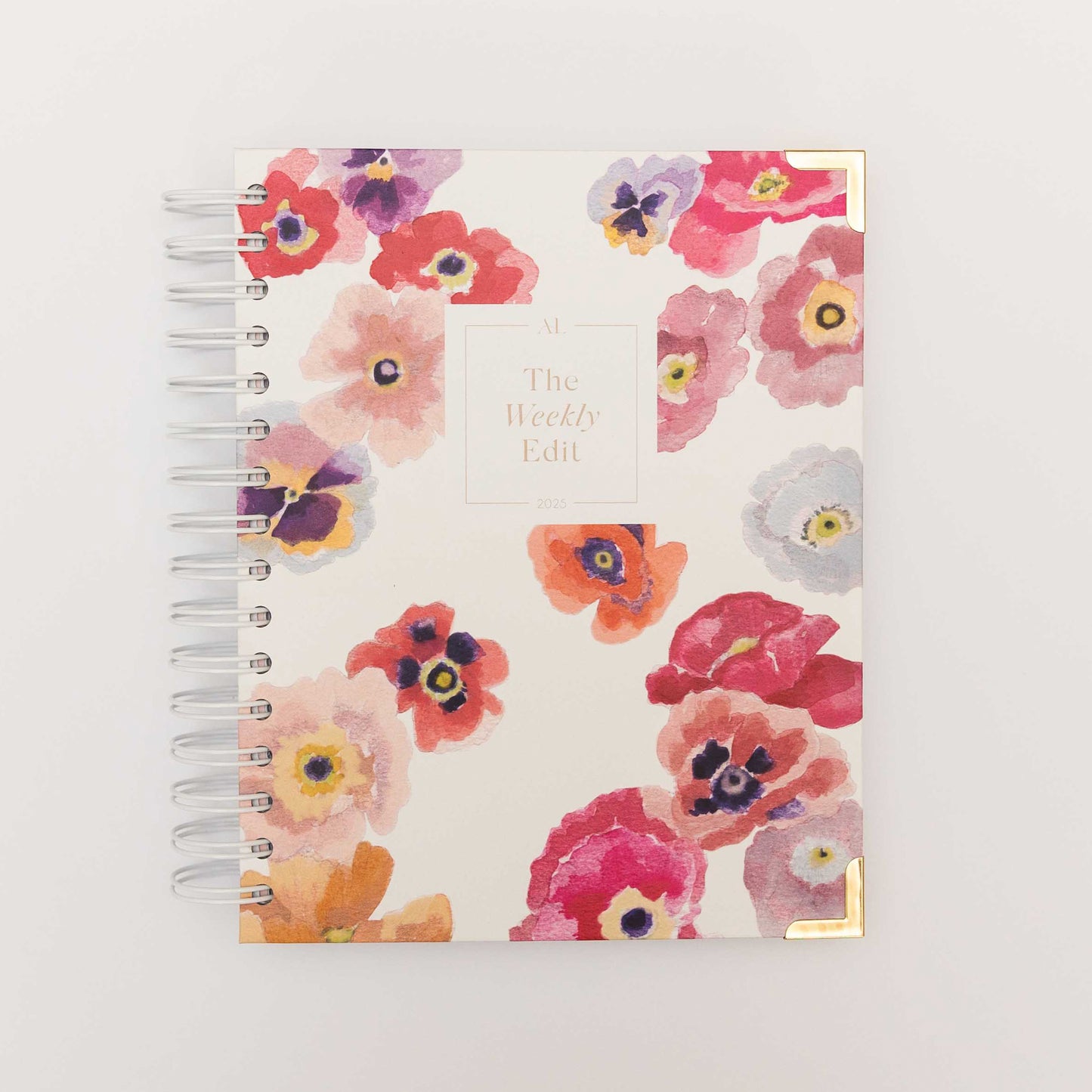 Alexa Lily floral cover The Weekly Edit - 2025 Planner with spiral binding and gold corner accents
