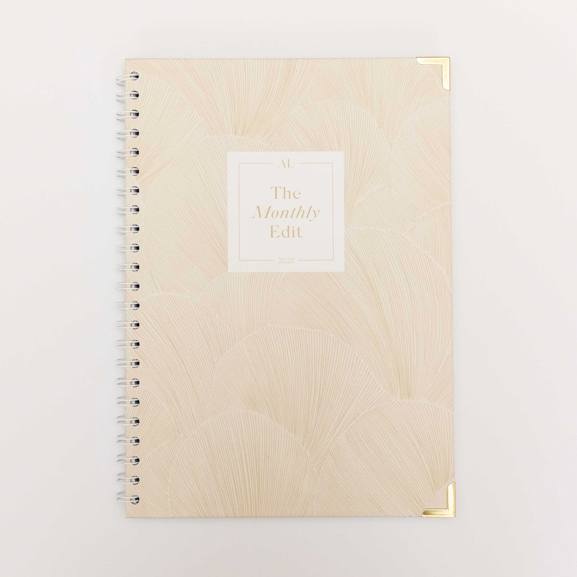 Alexa Lily The Monthly Edit - 2025 Planner with beige cover and gold corner protectors